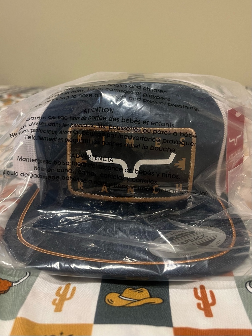 Kimes Ranch Navy Blue and Tan Trucker Hat